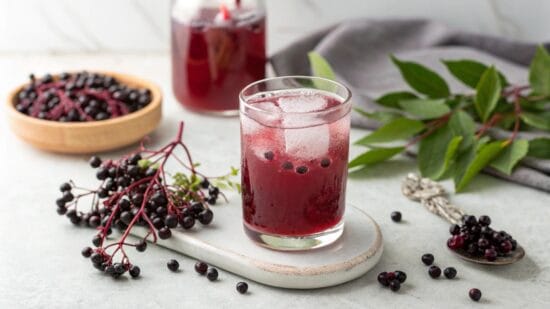 home made elderberry juice mixed with water high